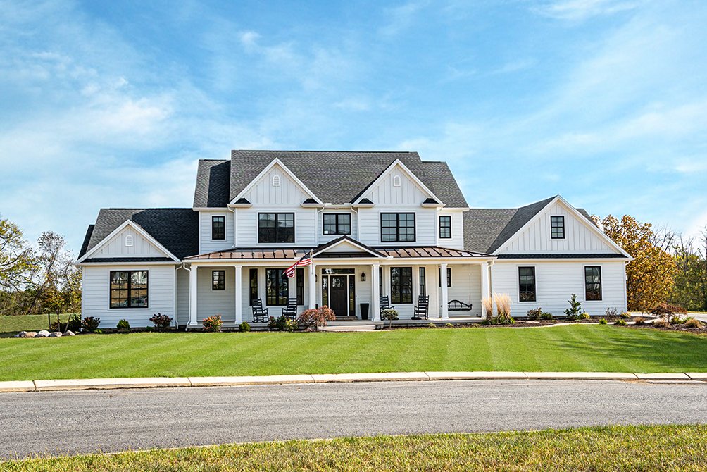 Farmhouse with durable sloped roofing