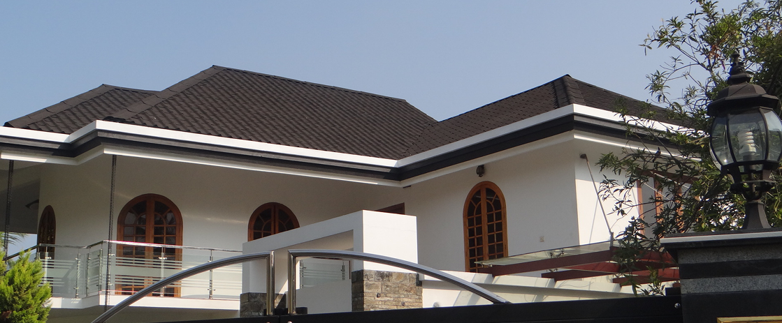 Roofing installation team at work